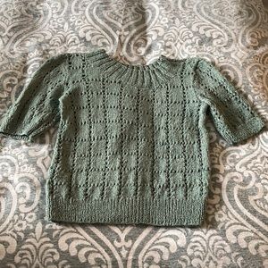 Green knitted sweater